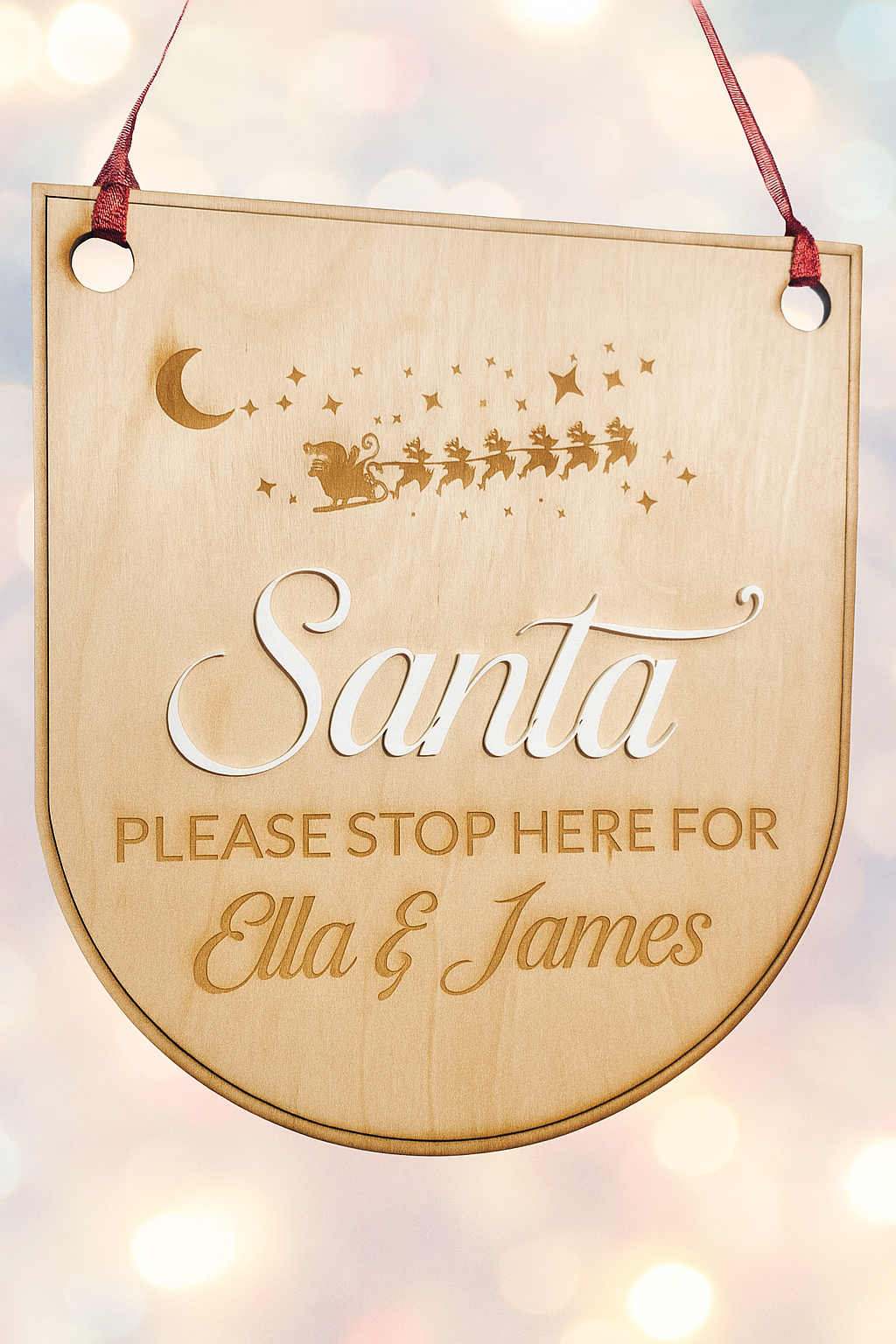 Personalised wooden Santa stop here signs.