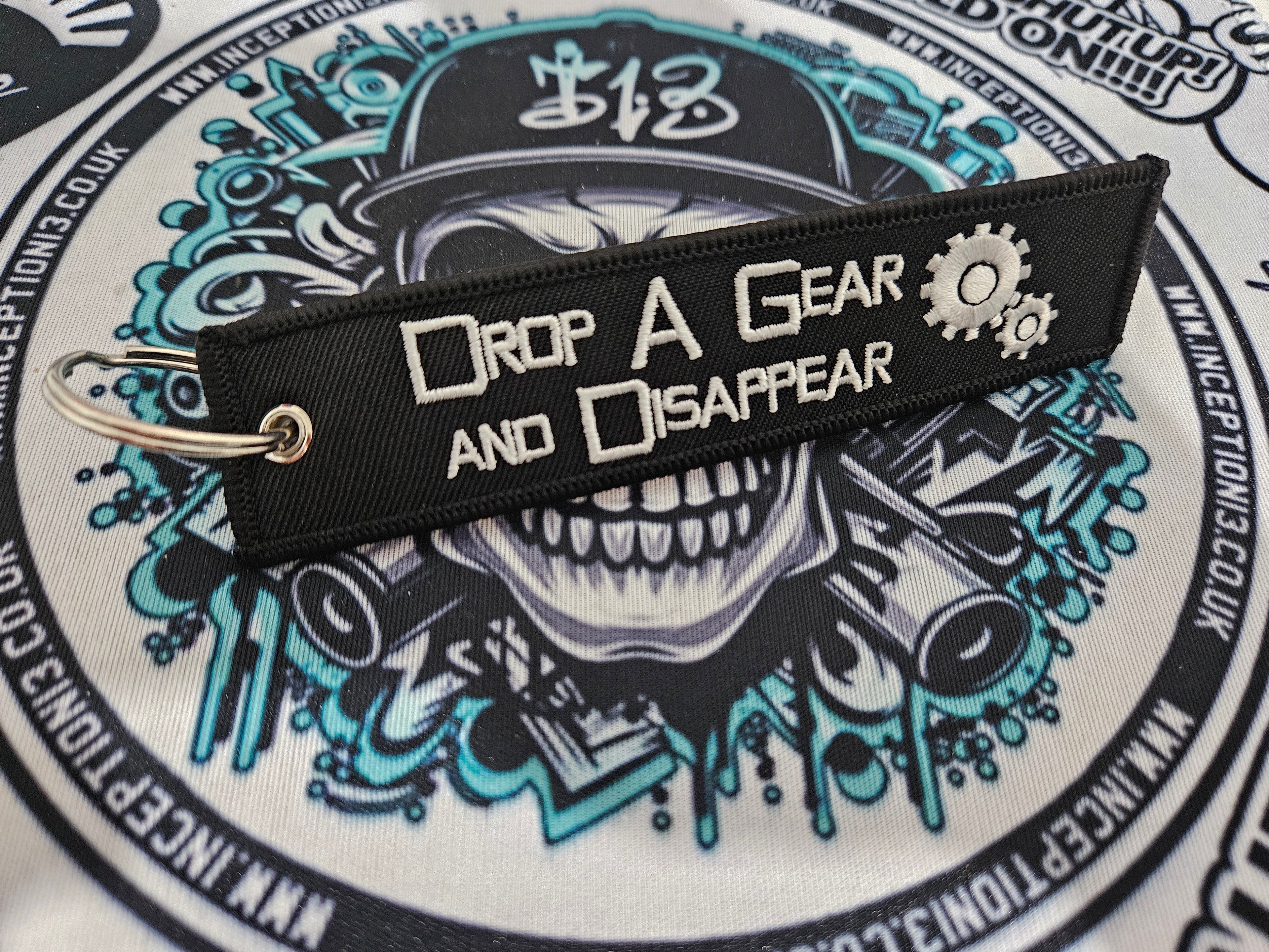 Drop a gear Disappear Jet Tag keychain